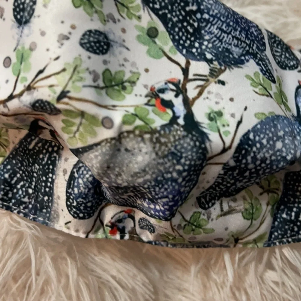 2/$10. New bird face mask